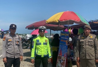 Personel Pospam Ops Ketupat Nala Laksanakan Patroli di Objek Wisata