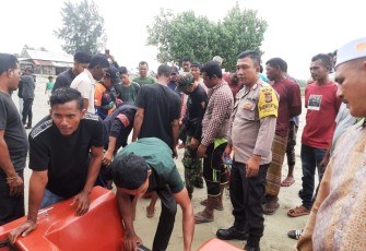 Petugas kepolisian saat mendatangi sekitar lokasi 