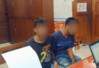 Dua tersangka saat diamankan