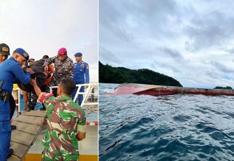 Petugas saat evakuasi satu korban meninggal