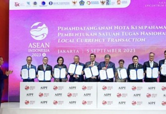 Presiden Jokowi saat Saksikan Penandatanganan Nota Kesepahaman Satgas Nasional Transaksi Mata Uang Lokal