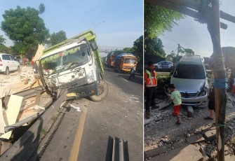 Truk pasca Tabrak Pembatas Jalan 