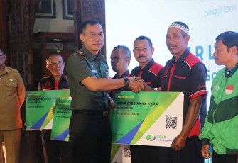 Dandim saat Ikuti Acara Launching Program Perlindungan Jaminan Sosial Ketenagakerjaan Tulungagung
