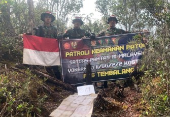 Satgas Pamtas Yonarmed 11 Kostrad Laksanakan Patroli Patok