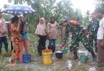 Air bersih hasil dari sumur bor di desa Selat Beting 