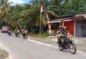Sejumlah Personil Babinsa Berkeliling Sosialisasikan Pilkada Serentak