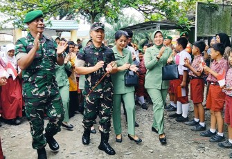 Kodim 0203/Langkat Pimpin Kegiatan  Peningkatan Gizi Anak Sekolah.