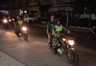Patroli bersama Banser di wilayah desa binaan 