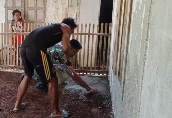 Pengecoran lantai rutilahu TMMD ke 126 Kodim Pacitan 