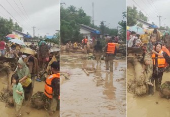 Prajurit TNI saat Evakuasi Warga Banjir Batangtoru, Tapanuli Selatan, Selasa (25/11/2025).