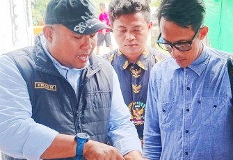 Kadisperkim  M.Irzan saat menjelaskan.