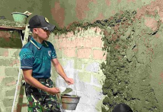 Bangun rumah warga di perbatasan