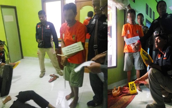 Tersangka saat melakukan adegan rekonstruksi di TKP