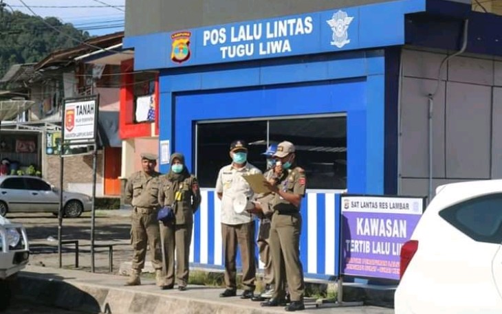Satpol PP Lambar Sosialisasikan SE Bupati Cegah Penyebaran Covid-19