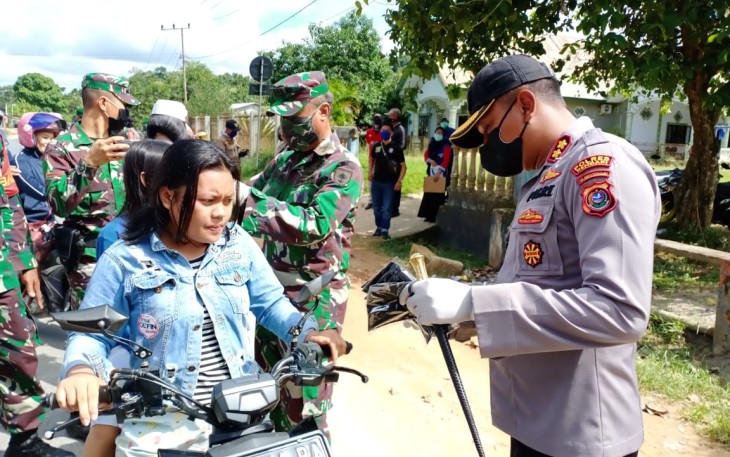 Kodim dan Polres Kendari Bagi 10.000 Masker Gratis ke Masyarakat