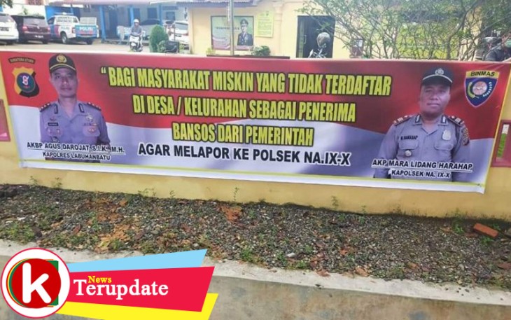 spanduk yang terbentang bertuliskan instruksi Kapolres Labuhanbatu