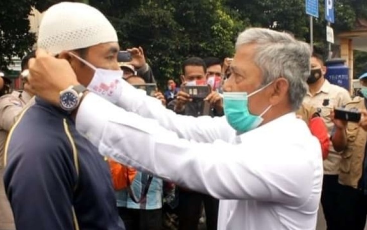 Pemkab OKI Gelar Bakti Sosial dan Bagikan Masker Pada Masyarakat 