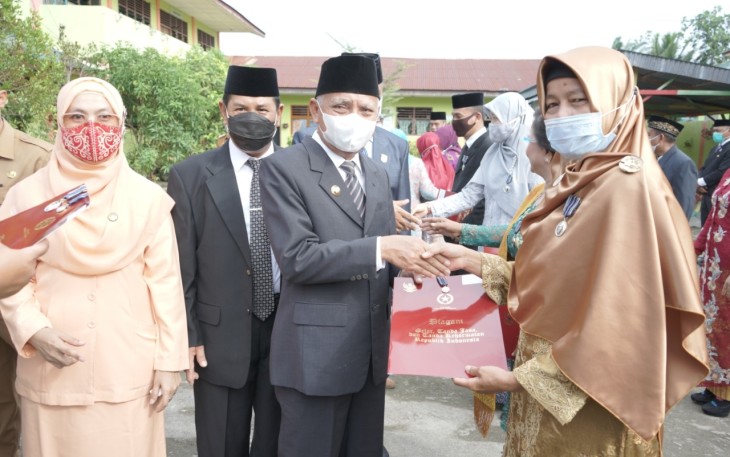 Bupati Kabupaten Asahan H Surya BSc Pimpin Upacara Peringatan Hari Amal Bakti ke-75