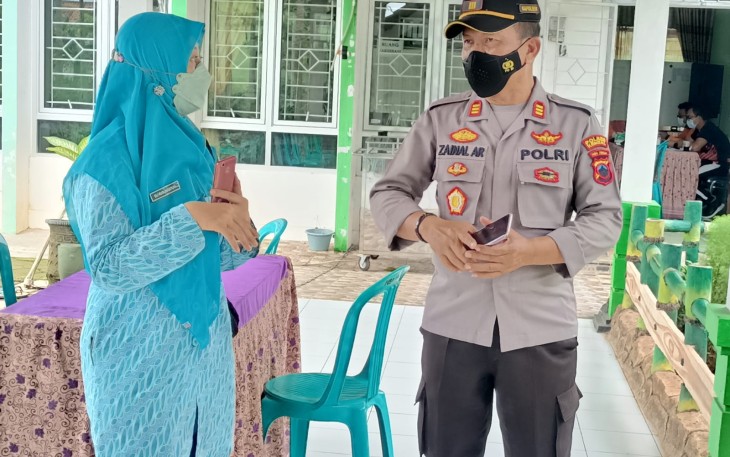 Kapolsek Pegandon berkoordinasi dengan Nakes untuk laksanakan vaksin, Minggu 28/11/2021