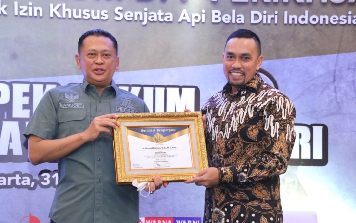 saat membuka Seminar Aspek Hukum Atas Senjata Api Bela Diri, di Jakarta, Kamis (31/3/22).