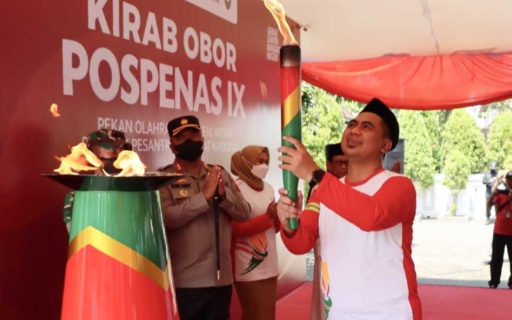 Kapolres Demak AKBP Budi Adhy Buono saat pelaksanaan pengamanan Kirab Obor Pospenas IX Tahun 2022