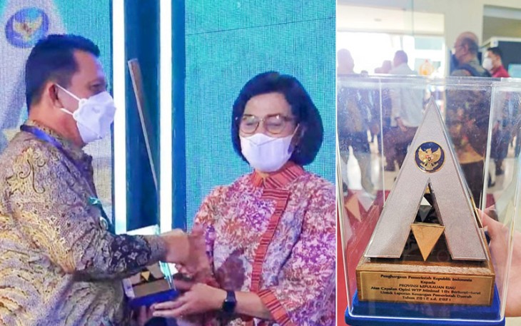 Gubernur Kepulauan Riau H. Ansar Ahmad saat terima penghargaan dari Menteri Keuangan Sri Mulyani dalam acara Puncak Rapat Kerja Nasional (Rakernas) Akuntansi dan Pelaporan Keuangan Pemerintah Tahun 2022 di Gedung Dhanapala, Kemenkeu, Jakarta, Kamis (22/9). 