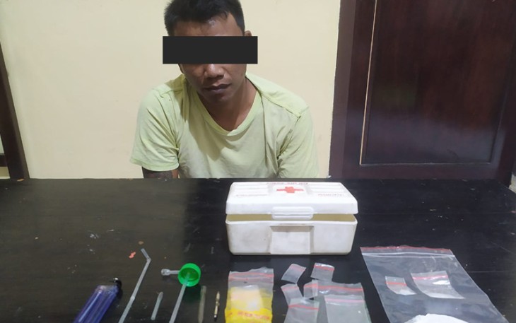 Tersangka dan barang bukti saat diamankan