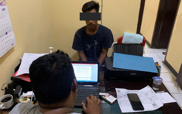 Terduga Pelaku saat diperiksa penyidik