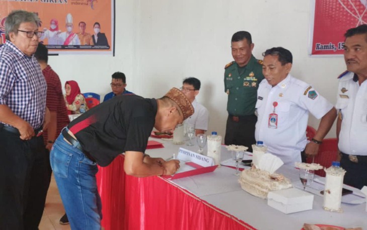 Danramil 1310-01/Bitung saat menghadiri musrembang