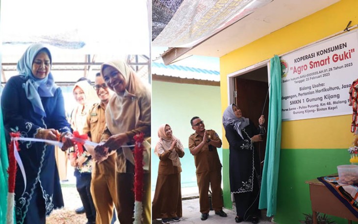 Dewi Ansar saat Serahkan Akta Notaris Koperasi Sekolah ke SMK N 1 Gunung Kijang