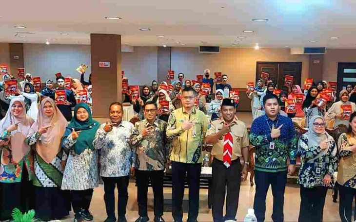 Foto bersama saat Bimtek Keamanan Pangan Bagi Pelaku Usaha Industri Rumah Tangga Pangan (IRTP) se Kota Tanjungpinang.