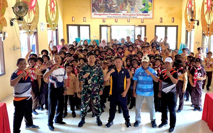 Pengamanan lomba baris berbaris di wilayah desa binaan 