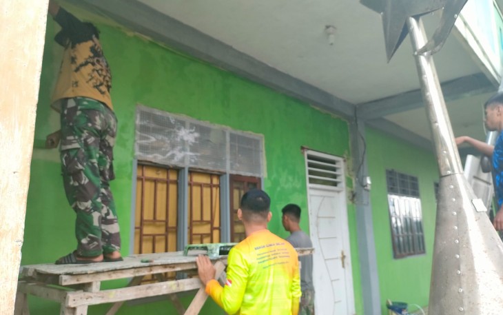 Satgas TMMD Lakukan Pengecetan Tembok Panti Asuhan Al-mutahdien Hidayatullah 