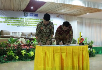 Penandatanganan MoU Antara Plt Gubernur Bengkulu Rohidin Mersyah dan Ketua KPTIK Dodi Yudianto