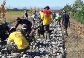 TMMD pembangunan jalan di Desa Jatimulya 