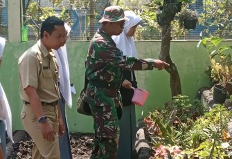 Dansatgas TMMD Kodim Demak Sebarkan Virus Peduli Lingkungan