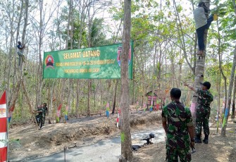 Banner Selamat Datang TMMD 106 Kodim Cilacap Dipasang