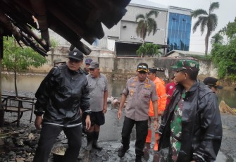 Empat Pilar Melakukan Kerja Bakti Pasca Banjir di Jakarta Barat 