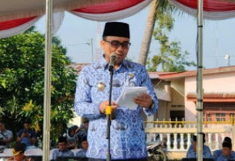 Wakil Bupati Batu Bara Oky Iqbal From SE sewaktu membacakan Pidato tertulis di Upacara Peringati Hari Kesadaran Nasional(HKN)