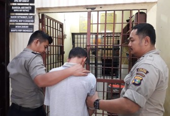 Satu pelaku yang ditangkap saat digiring ke Sel Tahanan 