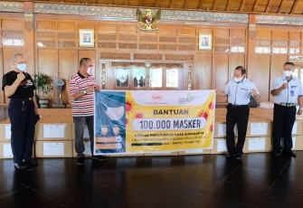 Penyerahan bantuan 100 ribu masker dari PT Sritex kepada pihak Pemkot Solo. (Foto Istimewa)