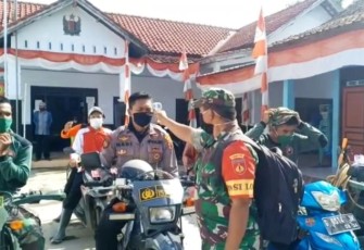 Tim Pencegahan Virus Corona Kodim Pekalongan Cek Suhu Tubuh Tamu Masuk Lokasi TMMD