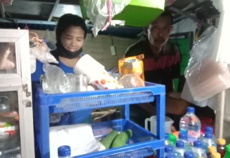 Marini Pedagang Murah senyum di Lokasi TMMD
