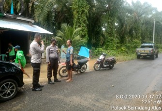 Kapolsek Semidang Alas IPDA Nopriza SHi Cek Rumah Warga Terdampak Banjir