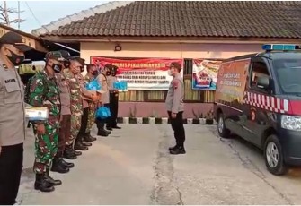 Kapolsek Pekalongan Utara Kompol Bakti Kautsar Ali, S.I.K,S.Sos,pimpin apel sebelum melakukan patroli Dialogis dan pembagian Masker serta penjagaan di lokasi wisata.