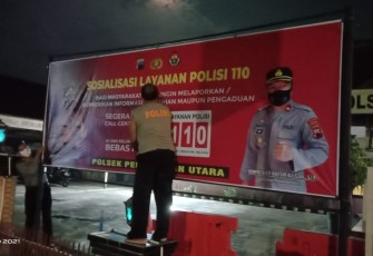 Polsek Pekalongan Utara telah terpasang Spanduk layanan 110, dengan ukuran besar didepan Mapolsek Pekalongan Utara Selasa,(25/5/2021)