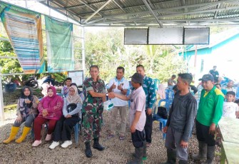 Saat kegiatan syukuran hasil panen sawah di desa Lamida Bawah. Jum'at (13/05/2022)