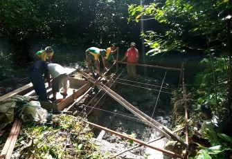 Pembangunan bak air Satgas Yonarmed dan masyarakat