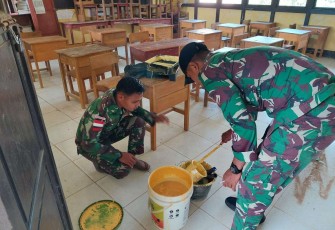 Pengecatan ruang kelas di perbatasan 