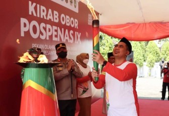 Kapolres Demak AKBP Budi Adhy Buono saat pelaksanaan pengamanan Kirab Obor Pospenas IX Tahun 2022